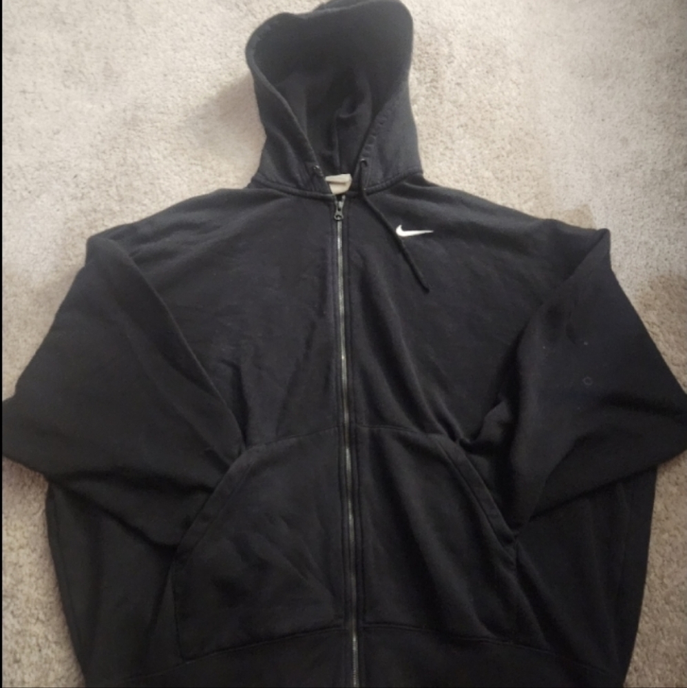 A black nike zipup